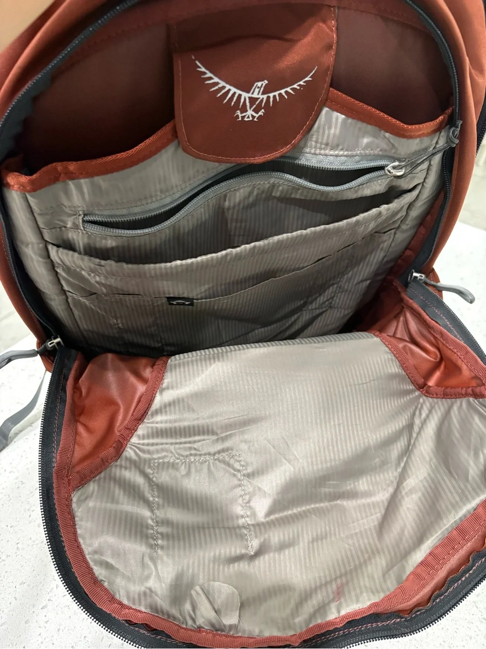 OSPREY Meridian Men's Backpack in Rust Brown